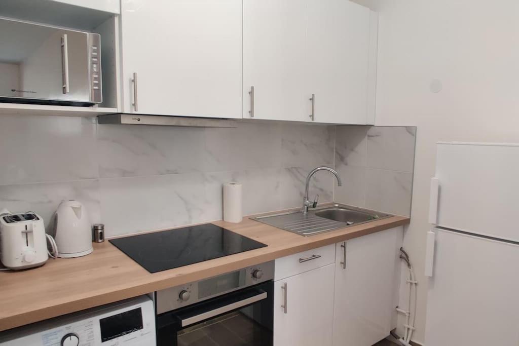 Appart Cosy Auber Porte De Paris أوبارفيلييه المظهر الخارجي الصورة